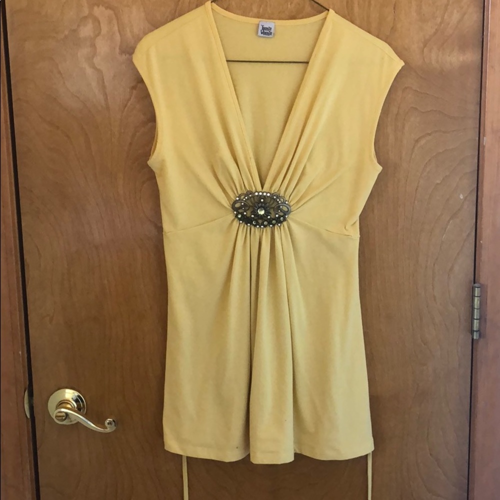 Yellow sleeveless blouse